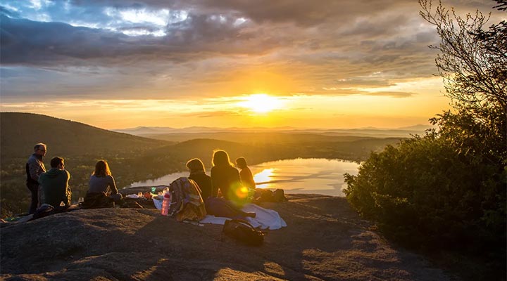 Get Connected Feature Image Group sunset on mountain