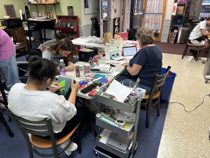 Youth and Volunteers Making Cards for Fuel The Spark Maker Space for Holiday Donation Drive